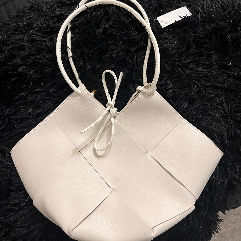 New with tags- Eggshell white woven purse from NY&CO